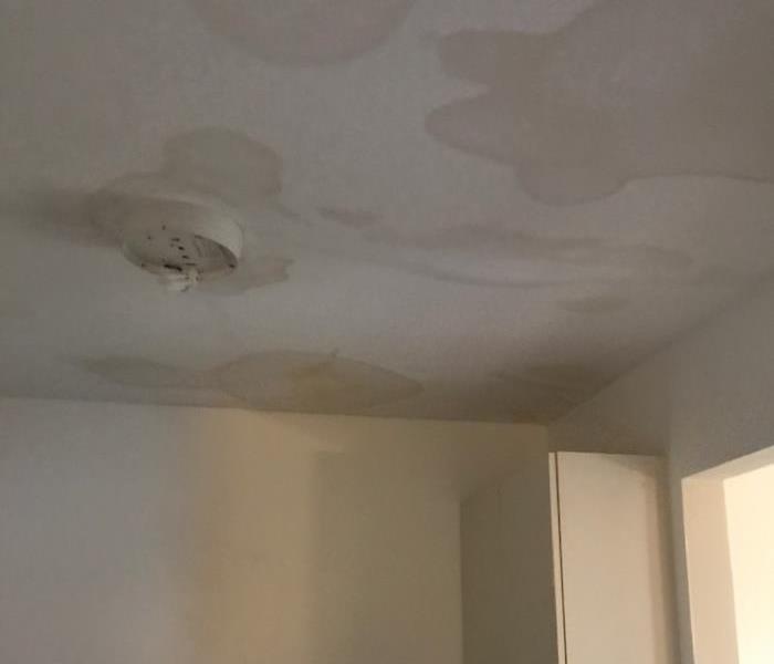 Ceiling with signs of water damage