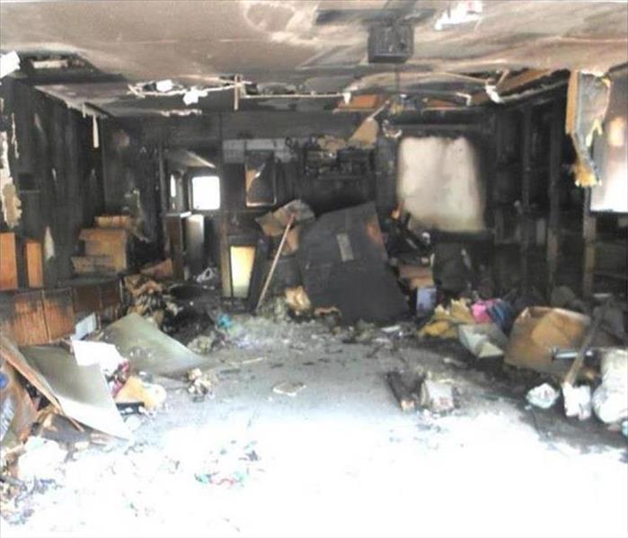 badly burned and charred garage interior