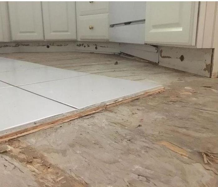Floor With Water Damage